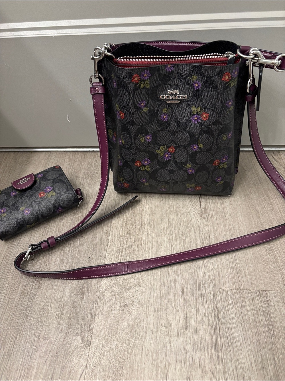 Coach Black Signature Floral Crossbody with Purple Trim
